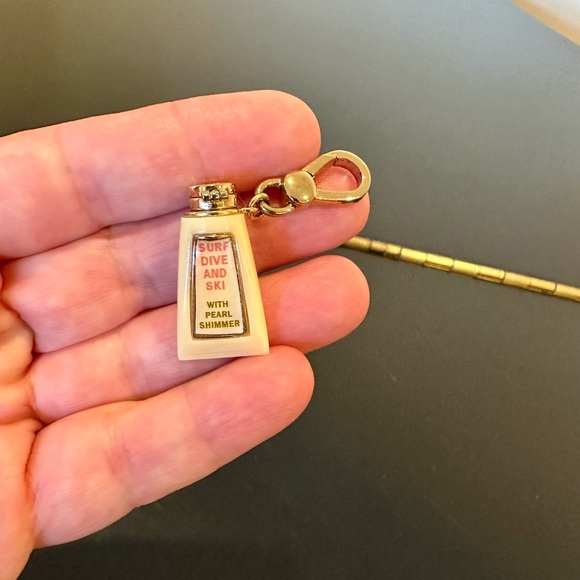 Juicy Couture Jewelry - NWOT Authentic Rare Juicy Couture suntan lotion charm